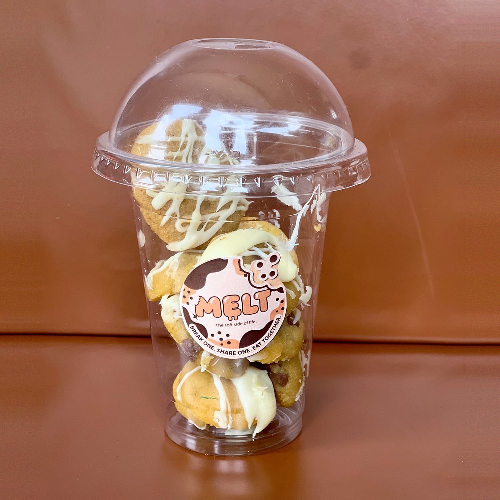 MELT. Hazelnut Choc Chip Cookie-in-a-Cup: mini cookies with white chocolate drizzle in a domed cup with the branded sticker