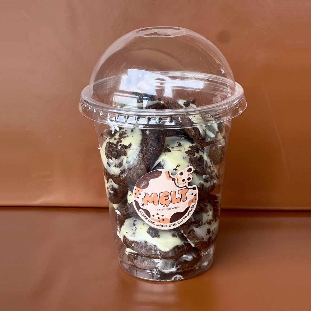 MELT. Oreo & Cream Cookie-in-a-Cup: mini Oreo cookies with cream cheese icing in a domed cup with the branded sticker